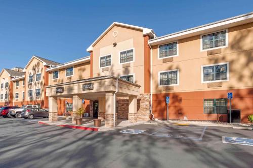 an empty parking lot in front of a building at Extended Stay America Suites - Orange County - Lake Forest in Foothill Ranch