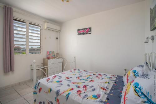 Postelja oz. postelje v sobi nastanitve T2 PITAYA, Trois-îlets vue mer