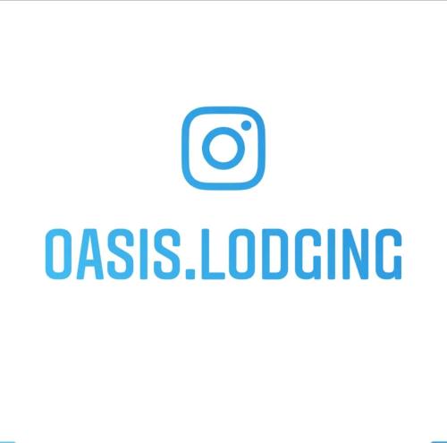 Oasis Lodging في بوينس آيرس: علامة مع كلمات dass التحميل عليها