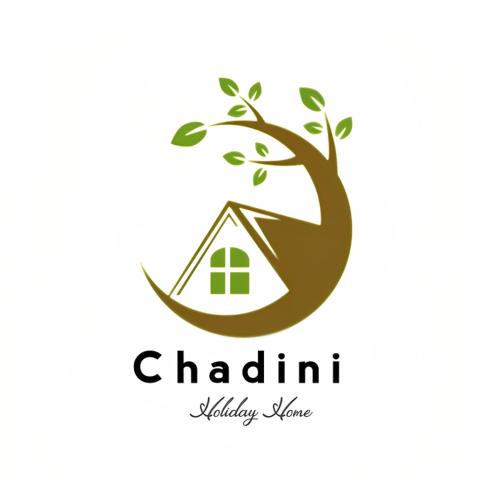 logotipo en forma de árbol con una casa en Chadini Holiday Home, en Gawarammana