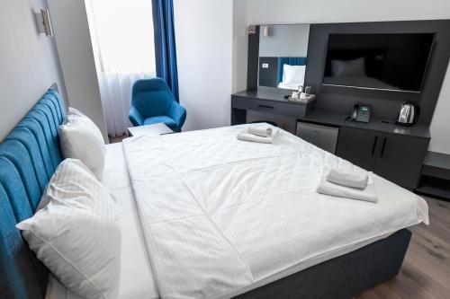 Posteľ alebo postele v izbe v ubytovaní Hotel Diamond