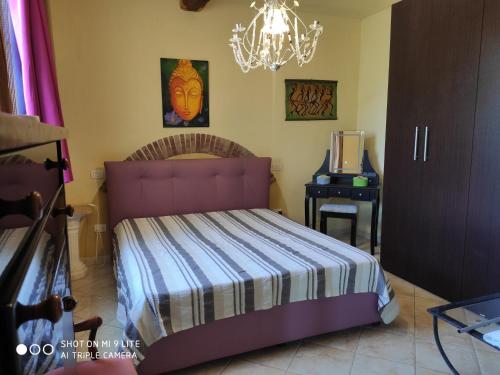 A bed or beds in a room at Appartamenti in Villa