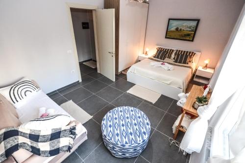 Postel nebo postele na pokoji v ubytování Costal Charm Apartment