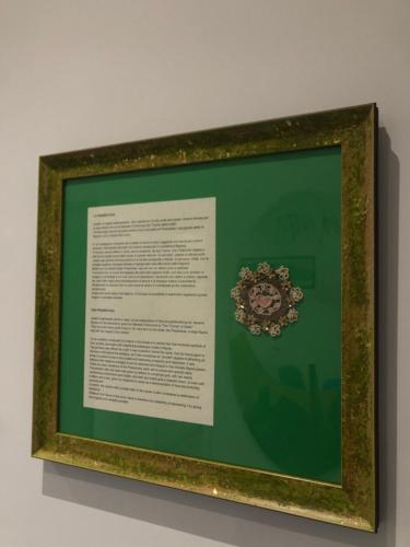 a framed picture of a flower on a wall at La Presentosa Bed&Breakfast in Ortona