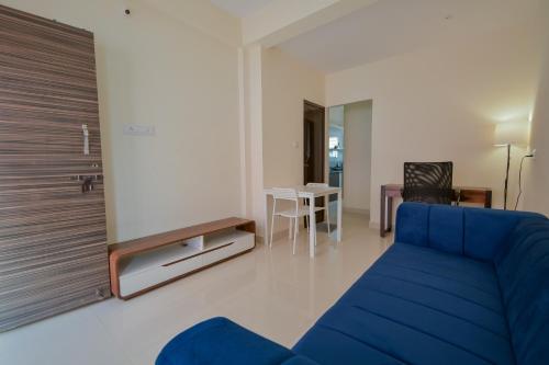 Χώρος καθιστικού στο HomeSlice Sarjapur - 1BHK Serviced Apartment