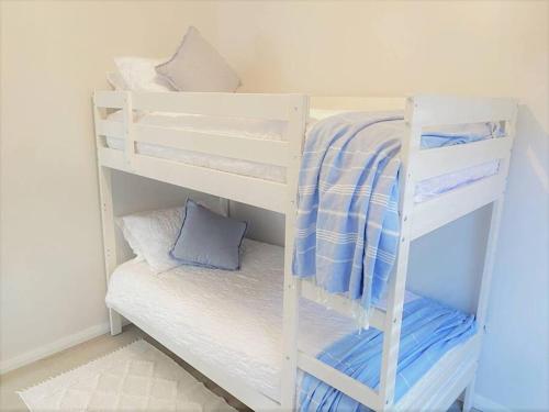 a couple of bunk beds in a room at Salt & Soul Beach Shack in Esperance