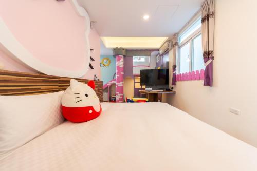 Televizorius ir (arba) pramogų centras apgyvendinimo įstaigoje Rococo Homestay