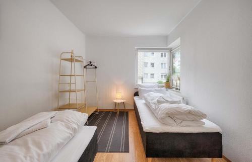 Postel nebo postele na pokoji v ubytování Select-Home 3 - Netflix - Parkplatz - Business Home