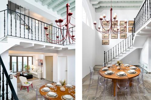 a dining room with a table and a staircase at Magno Apartments Fabiola 7 Luxury House in Seville