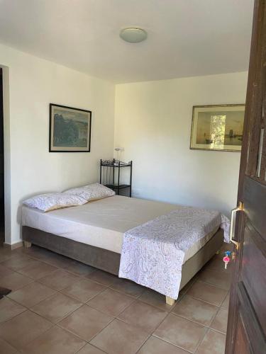 Postel nebo postele na pokoji v ubytování Ωραία Θέα