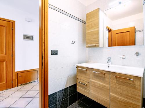 a bathroom with a sink and a shower at Apartment Carmen-3 by Interhome in Soraga
