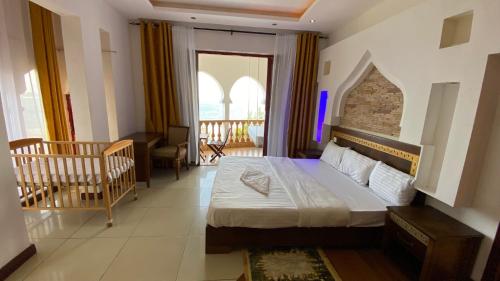 Ein Bett oder Betten in einem Zimmer der Unterkunft Shanzu Seabreeze Apartments