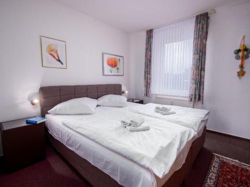 Postel nebo postele na pokoji v ubytování Apartment Borkum by Interhome