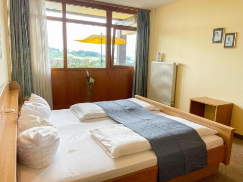Ένα ή περισσότερα κρεβάτια σε δωμάτιο στο Apartment AktiVital Hotel-3 by Interhome
