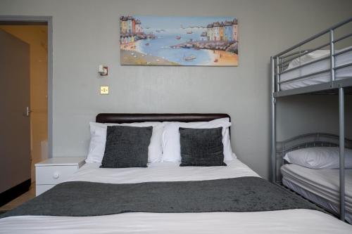 Кровать или кровати в номере Wellow Hotel