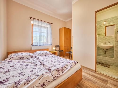 Ένα ή περισσότερα κρεβάτια σε δωμάτιο στο Holiday Home Marika by Interhome