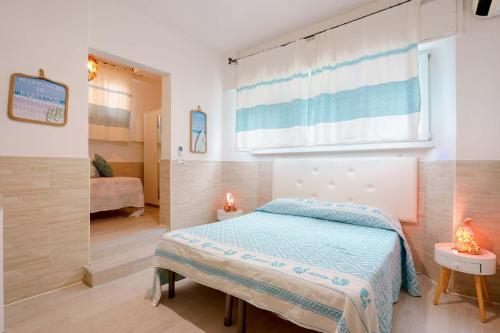 Postel nebo postele na pokoji v ubytování Villabeachcity Guesthouse