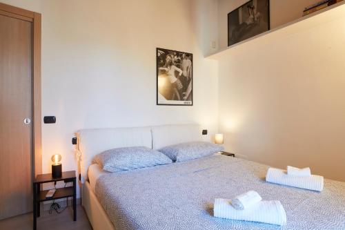 Crocetta Modern Flat tesisinde bir odada yatak veya yataklar