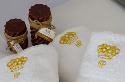 a group of towels with chocolate and cookies on them at Hotel Terme Principe in Abano Terme