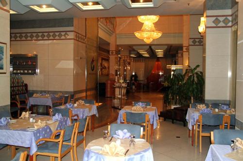 A restaurant or other place to eat at Spark Residence Hotel