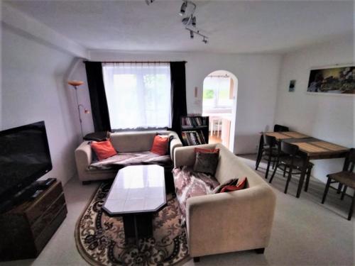 Posezení v ubytování Apartmán se zahradou