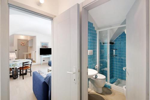 a bathroom with a sink and a toilet in a room at Oceane Paradise - Luigi 14 in Levanto