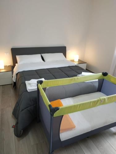 a bedroom with two bunk beds in a room at Novatek Apartment B&B in Chieti