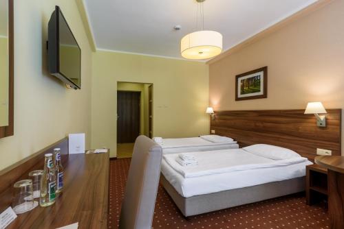 TV a/nebo společenská místnost v ubytování Hotel Podium