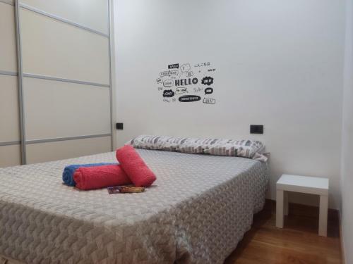 Giường trong phòng chung tại Pleno centro, Terraza, Principe, 5 min casco vello y estación AVE