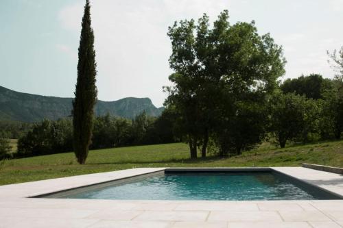 Πισίνα στο ή κοντά στο Magnifique maison en pierre avec piscine