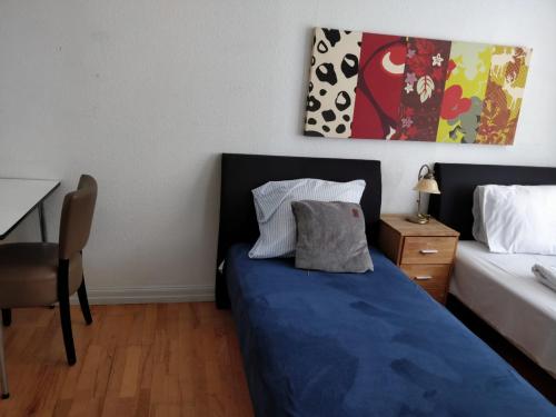 Łóżko lub łóżka w pokoju w obiekcie Guesthouse Copenhagen