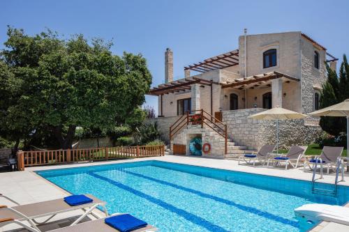Villa Eleftherna - Majestic Evergreen Retreat with Scenic Views