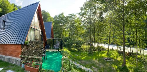 an aerial view of a house with a swimming pool at Lelvani Suite Bungalow in Rize