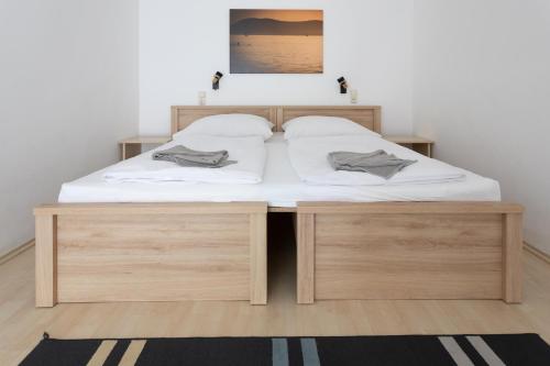 מיטה או מיטות בחדר ב-Hotel Platán
