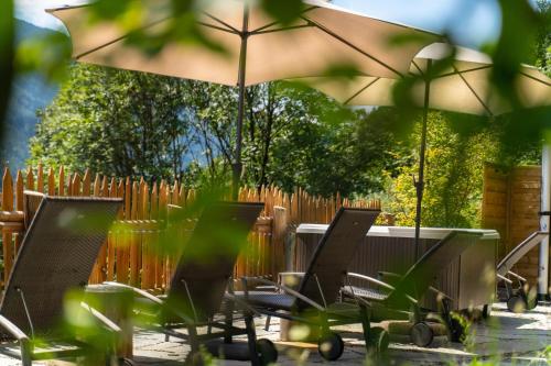 Κήπος έξω από το Apartments, Guest House & historic Chalet Neuhaus