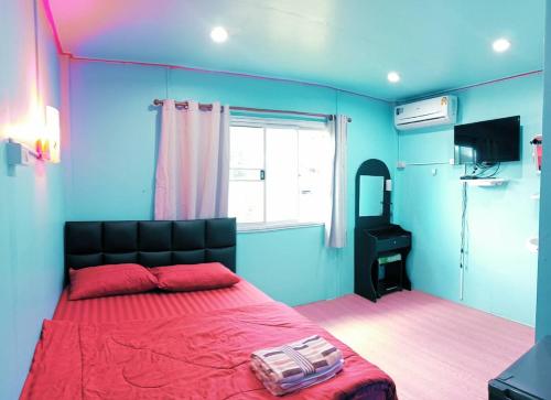Postel nebo postele na pokoji v ubytování Inthanon Lao-Ju House