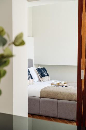 Letto o letti in una camera di Art Palace - LoftAffair Collection
