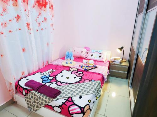 a small childs bedroom with a hello kitty bed at Puchong HELLO KITTY Fully Air-Con Suite 47130 Puchong Selangor in Puchong