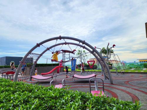 a playground with a slide and a roller coaster at Puchong HELLO KITTY FULLY AIR-CON Suite in Puchong