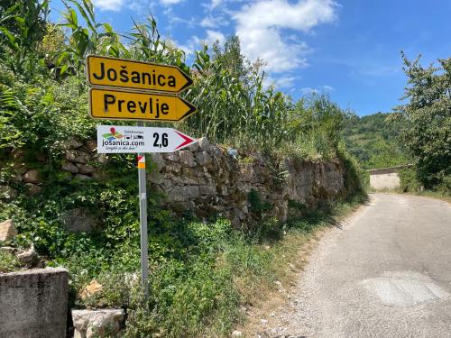 a street sign on the side of a road at Josanica Bed&Breakfast in Konjic