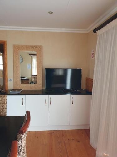 TV a/nebo společenská místnost v ubytování Dibiki Holiday Resort