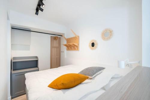Posteľ alebo postele v izbe v ubytovaní T2 - Rue de la République - Cosy