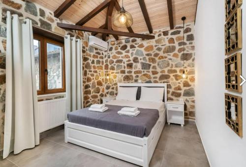 Posteľ alebo postele v izbe v ubytovaní Petra Residence