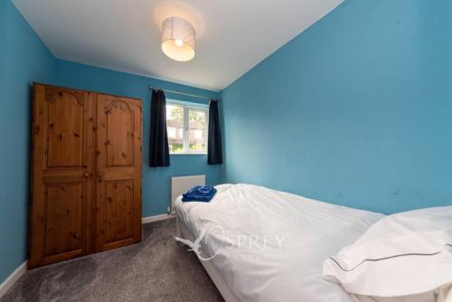 Een bed of bedden in een kamer bij Bellamy Road - 3 Bedroom home