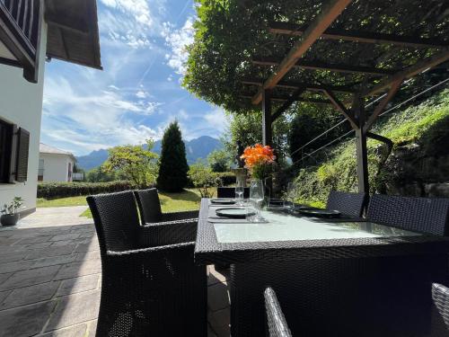 a table and chairs on a patio at Ferienwohnung Bad Reichenhall (Nonn) in Bad Reichenhall