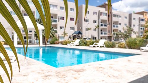 Bazén v ubytování Apartamento en la Romana 600 metros de la playa nebo v jeho okolí
