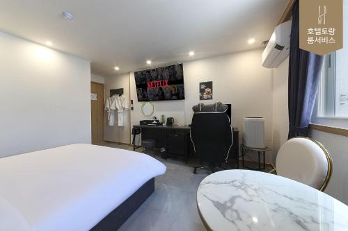 Hotel Torang Jeonjuにあるベッド