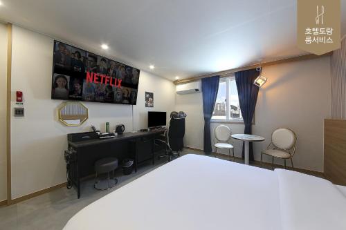 Hotel Torang Jeonjuにあるベッド