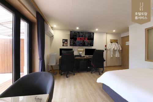 Hotel Torang Jeonjuにあるベッド