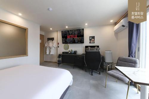 Hotel Torang Jeonjuにあるベッド